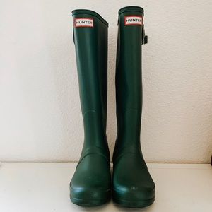 Dark green hunter boots